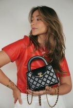 23K Black Shiny Aged Calfskin Quilted Nano Kelly Shopper Aged Gold Hardware - Image 2