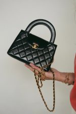 23K Black Shiny Aged Calfskin Quilted Nano Kelly Shopper Aged Gold Hardware - Image 10
